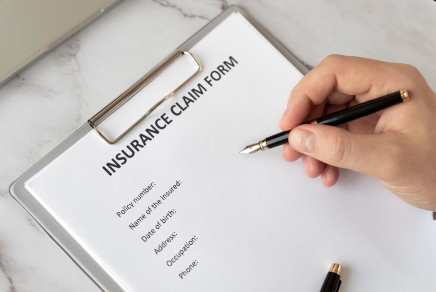 Insurance claim form being completed to prepare for an insurance claim