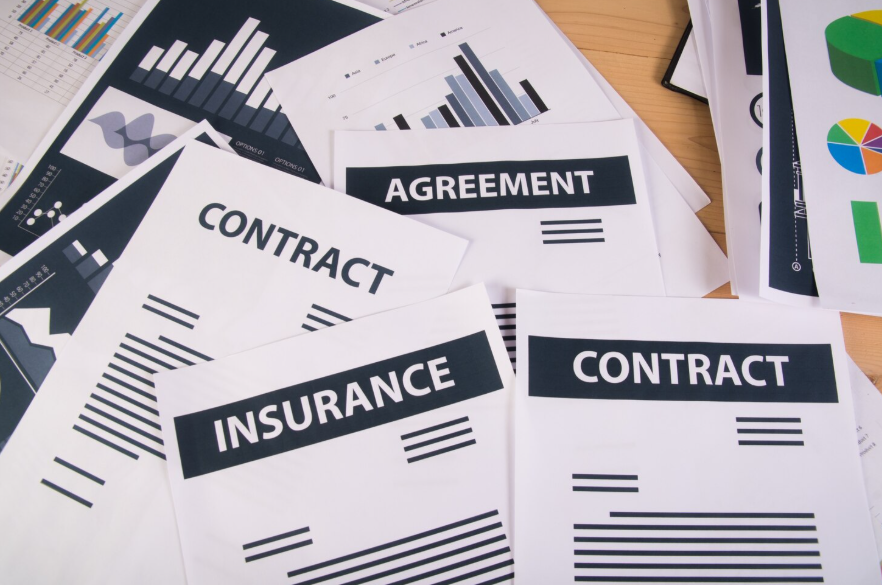 Insurance contracts and agreements showing confusing insurance terms