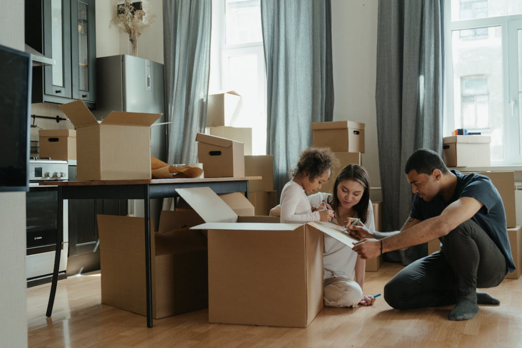 Family moving into new home showing when to review your insurance policy