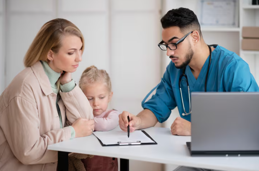 Mother and child meeting doctor to understand how supplemental insurance works for medical costs
