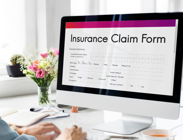 Person submitting insurance claim illustrating how claims history affects insurance premiums